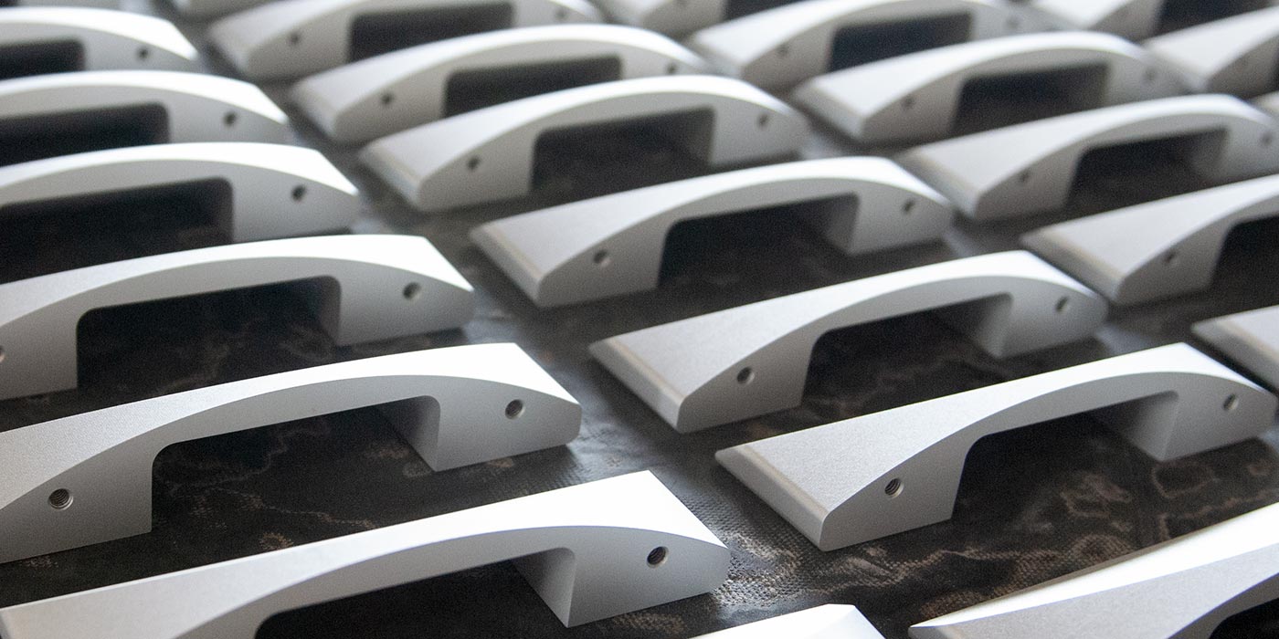 Sand blasted manufactured parts